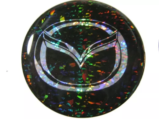 наклейка (объемная) "На колпаки "Mazda" наружная голограф., (цвет черный), (комплект4шт.), диам.4см